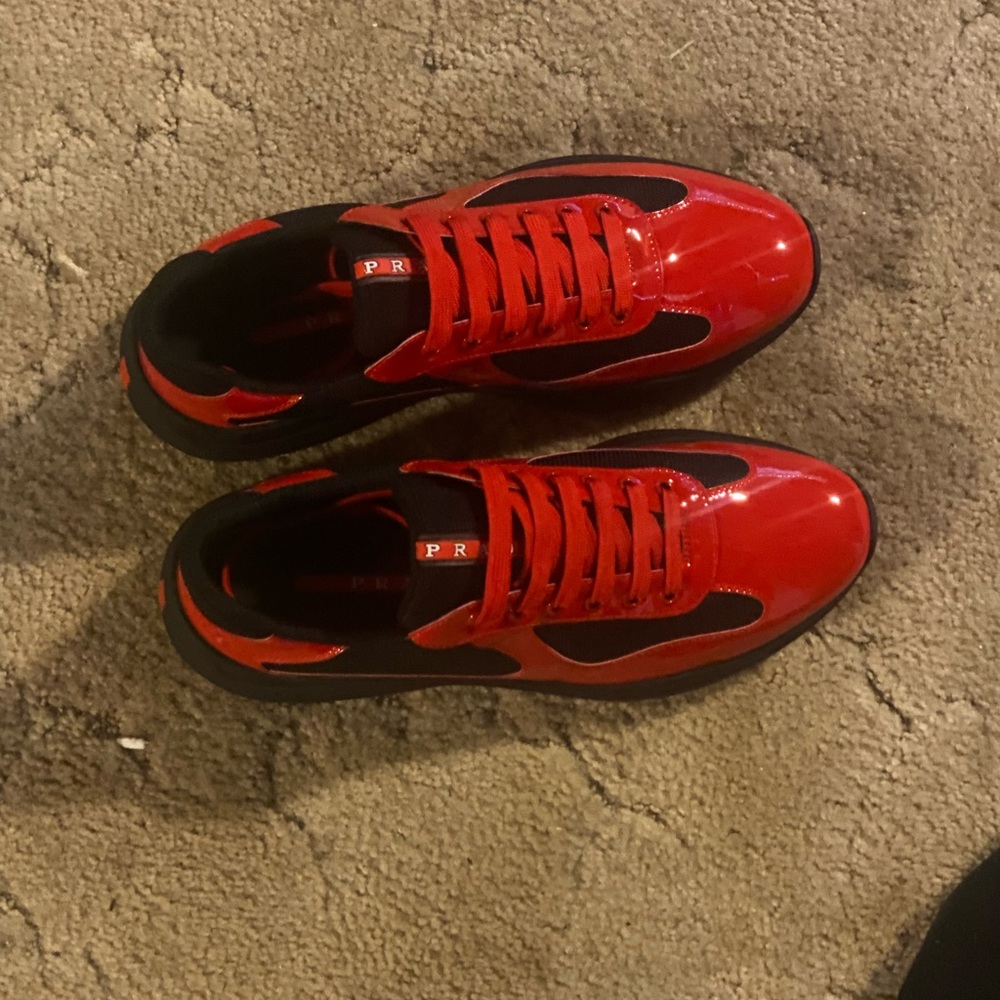 Black and red pradas